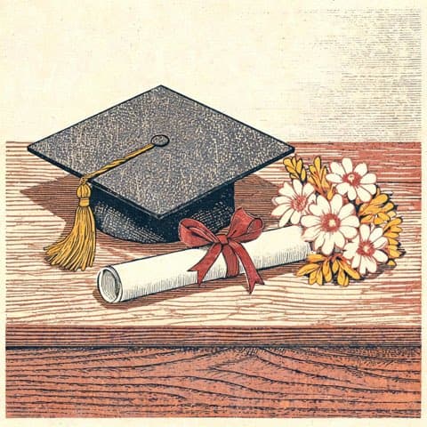 A graduation cap, diploma and flowers on a wooden table