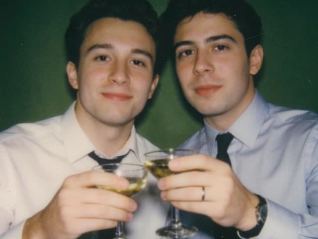 The same two friends laughing together